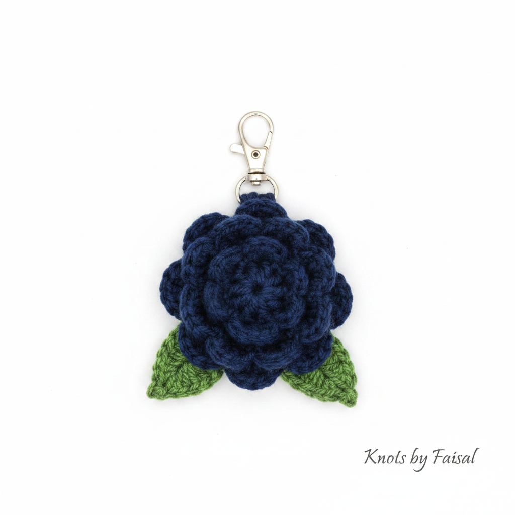 Navy crochet flower keychain by Knots by Faisal