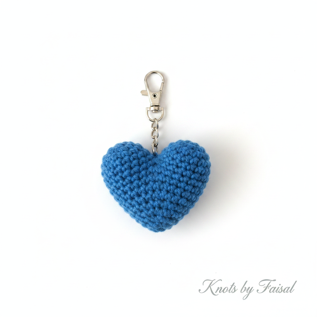Blue crochet heart keychain by Knots by Faisal