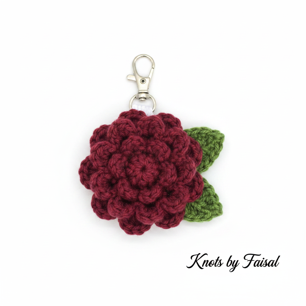 Maroon crochet flower keychain by Knots by Faisal
