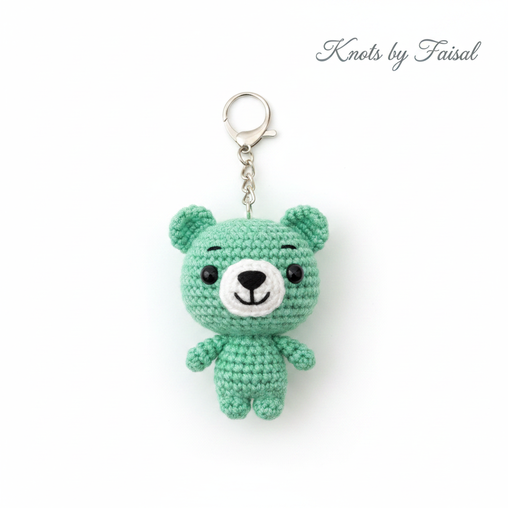 Green crochet bear keychain by Knots by Faisal
