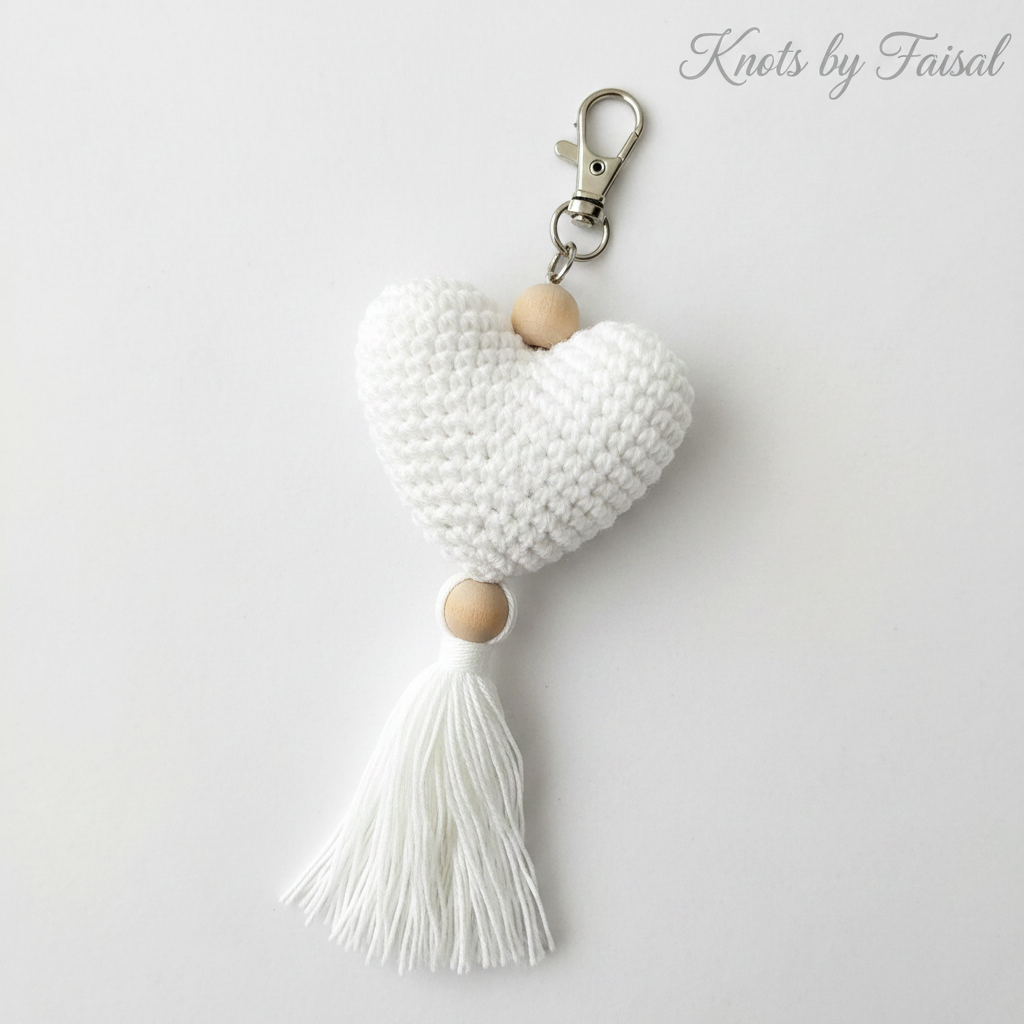 White crochet heart keychain with tassel by Knots by Faisal