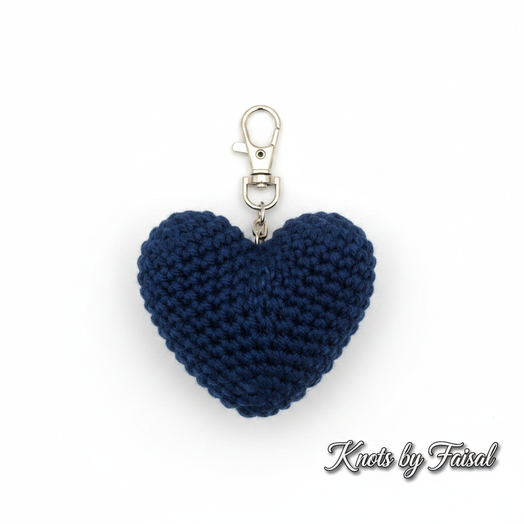 Navy crochet heart keychain by Knots by Faisal