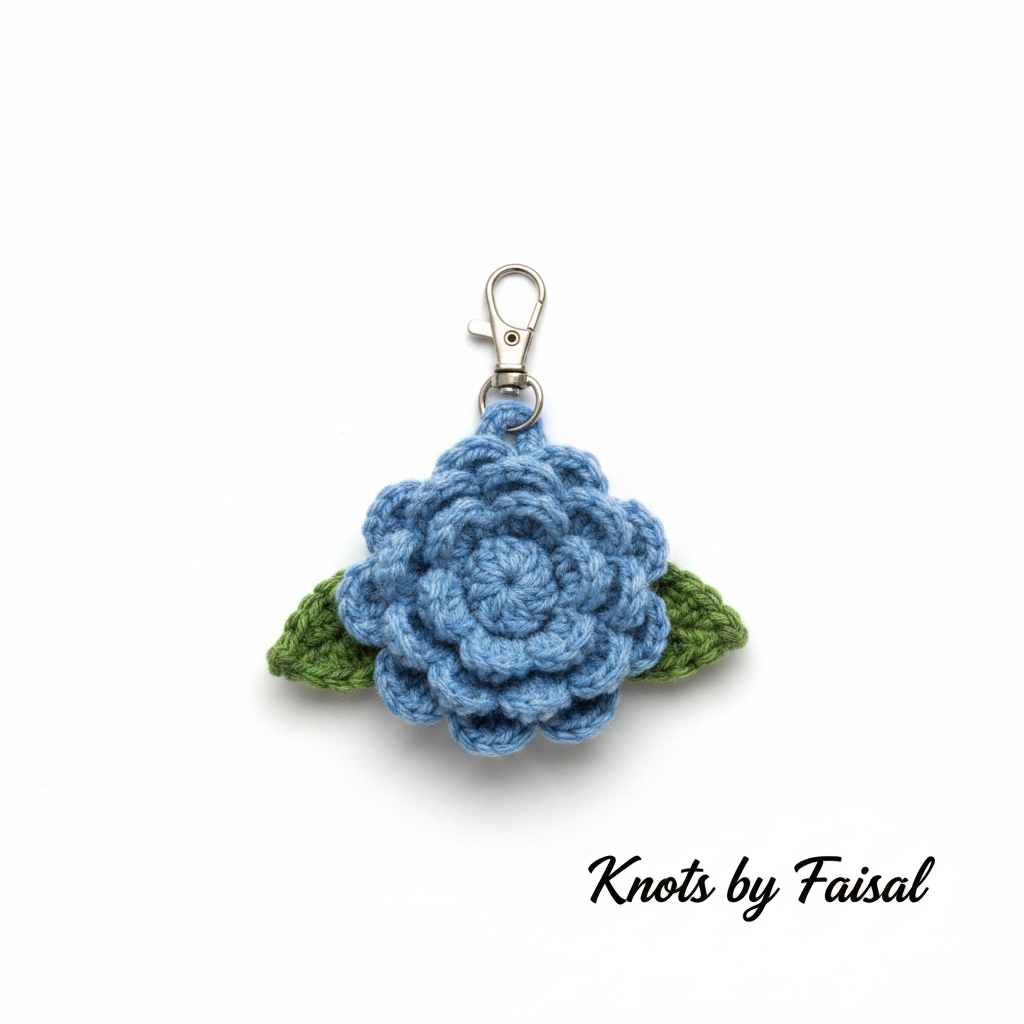 Blue crochet flower keychain by Knots by Faisal